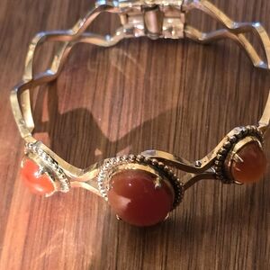 Elegant Gold and Red Bracelet